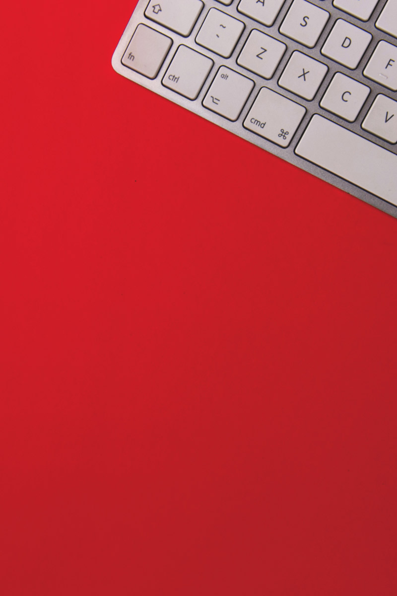 Keyboard on red background