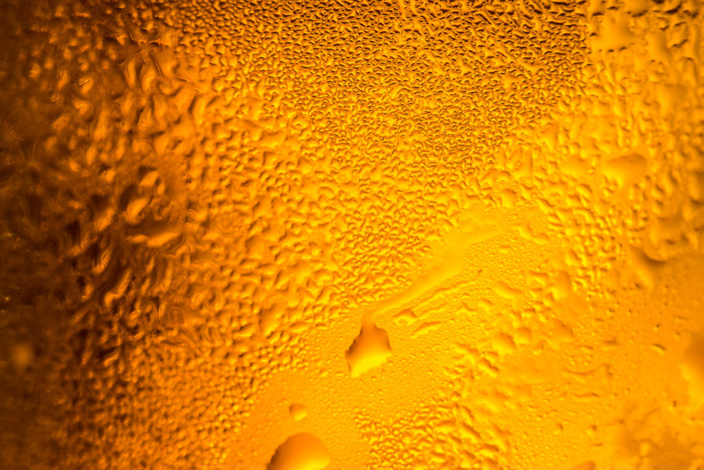 picture of a beer in a glass with water drops for download