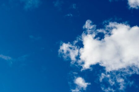 Blue Sky with White Clouds Background.